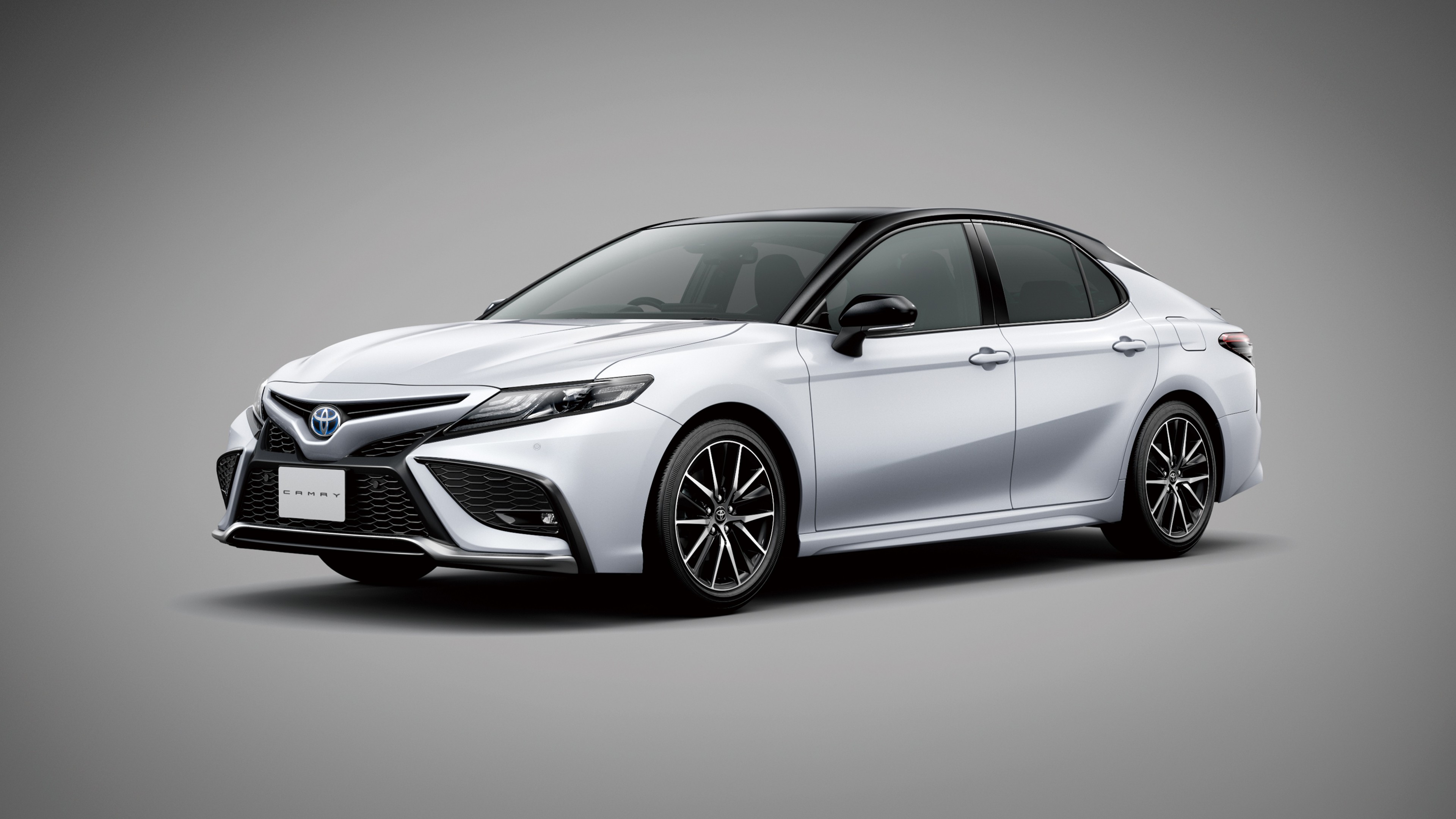 White Toyota Camry about page background